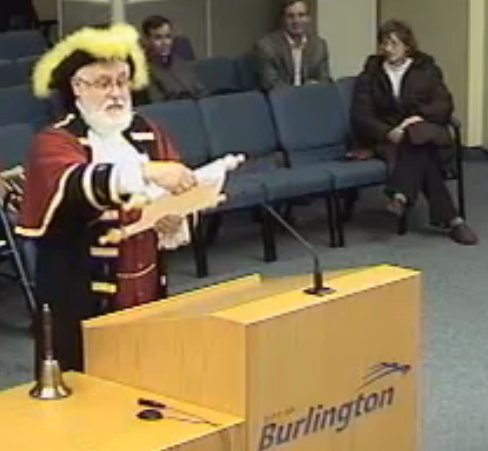 Town Crier David Vollick reading the message from Gazette publisher Pepper Parr at Council in December of 2011.