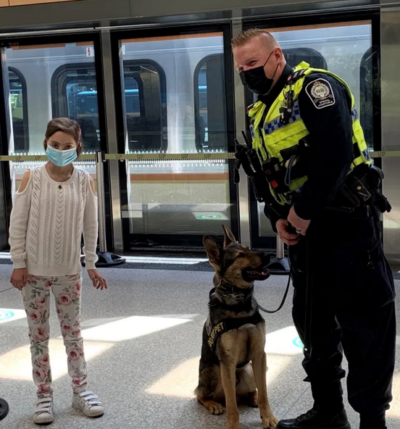 metrolinx girl with police dog