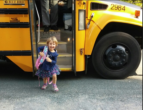 Child getting off school bus